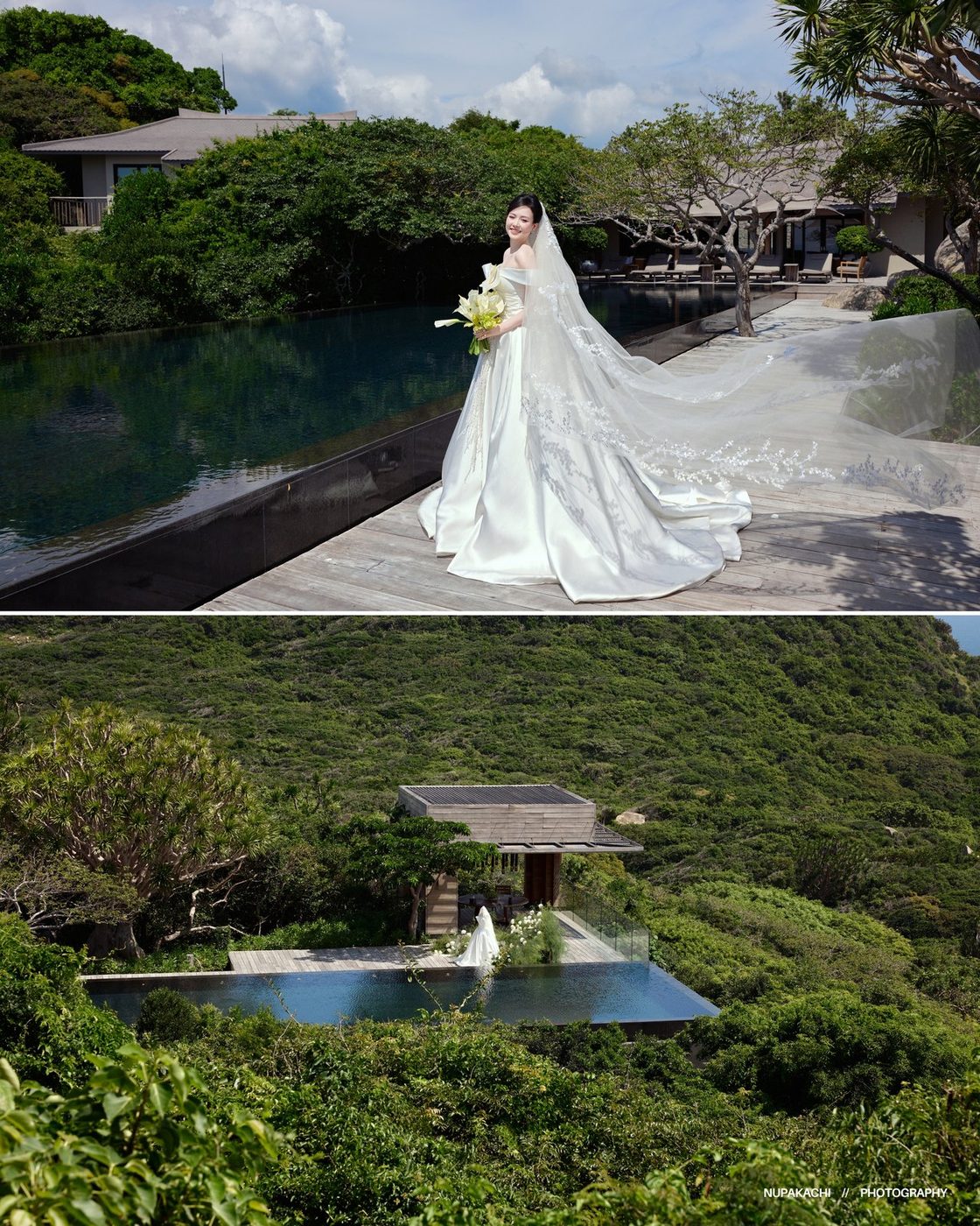 Bride overlooking the jungle and the sea from a villa pool deck, destination pre-wedding in Vietnam