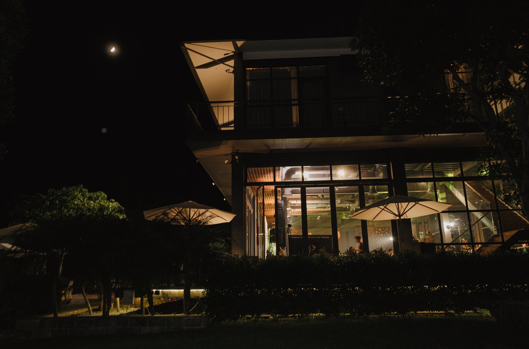 Destination wedding venue glowing at night among the hills, Vietnam
