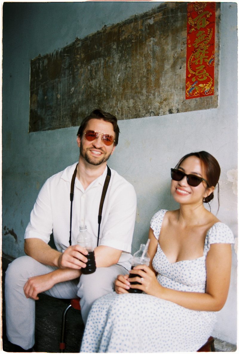 Couple in linen on the streets of District 5, Saigon, on 35mm film (frame 3 of 6)