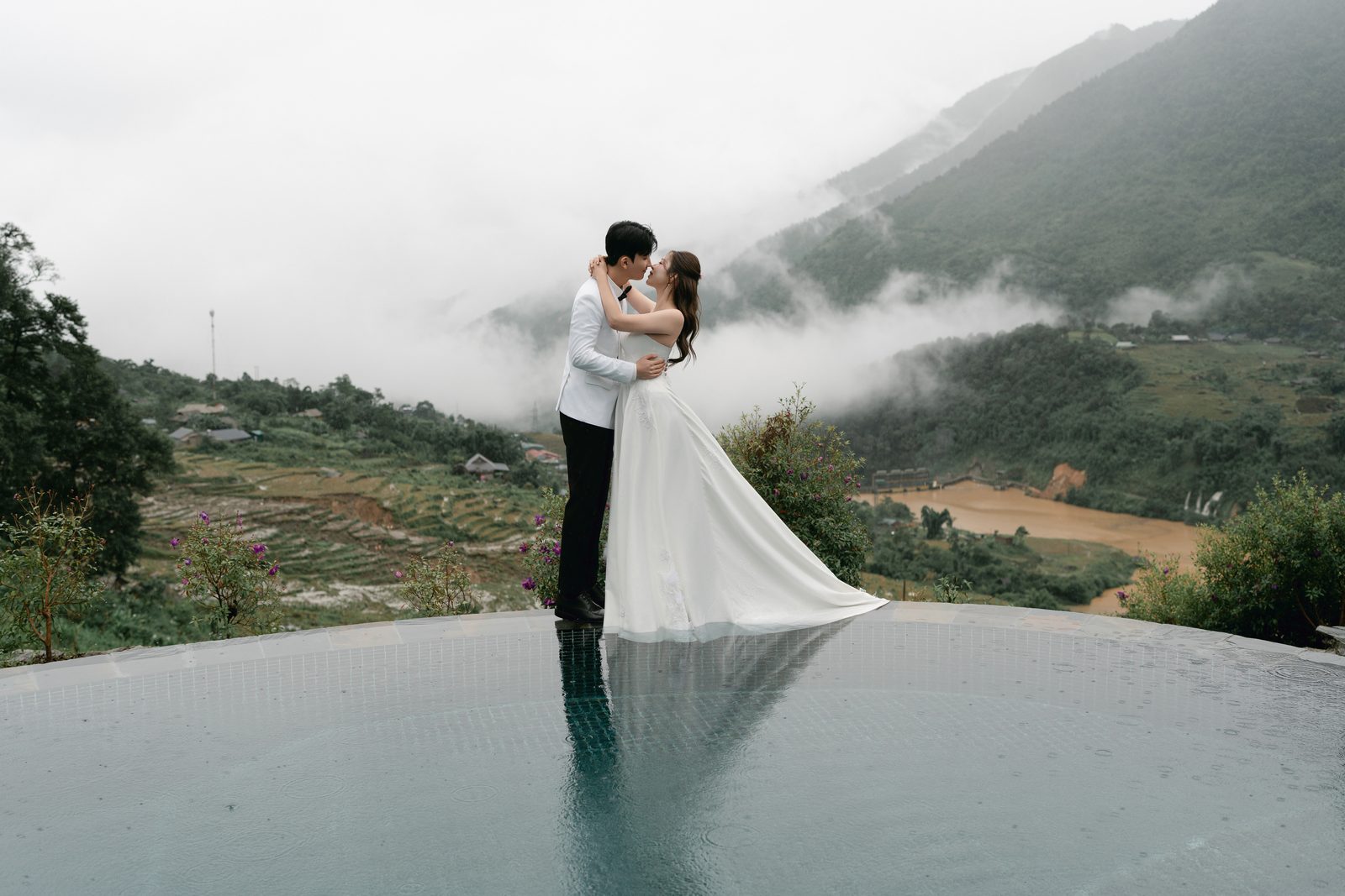 Above the clouds in Sapa, on a terrace pool that mirrors the sky