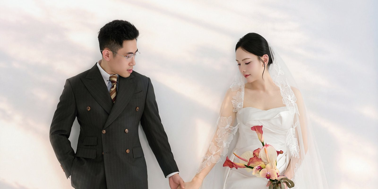 Bride and groom holding hands in soft light, wedding photography by Nupakachi Vietnam
