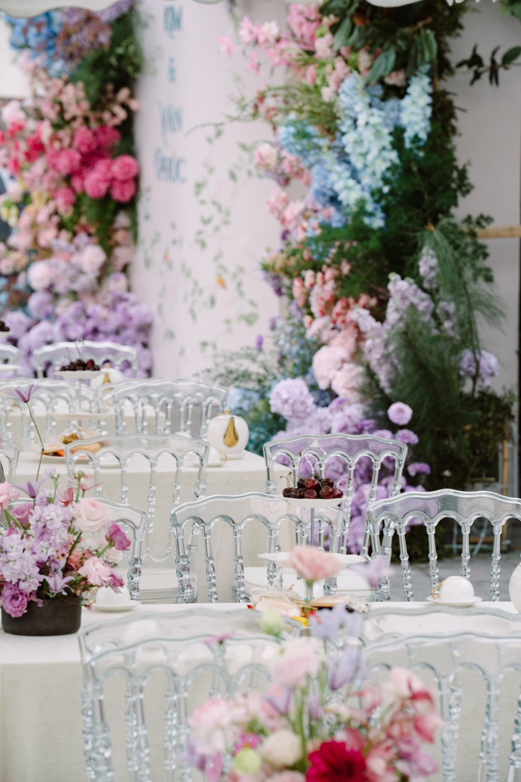 Pastel floral dessert table styling at a luxury Vietnam wedding reception