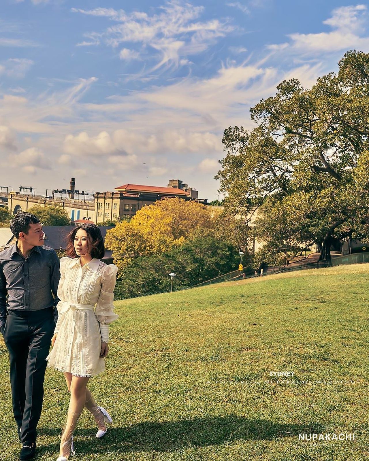 Strolling the gardens with Sydney Harbour Bridge behind, Australia