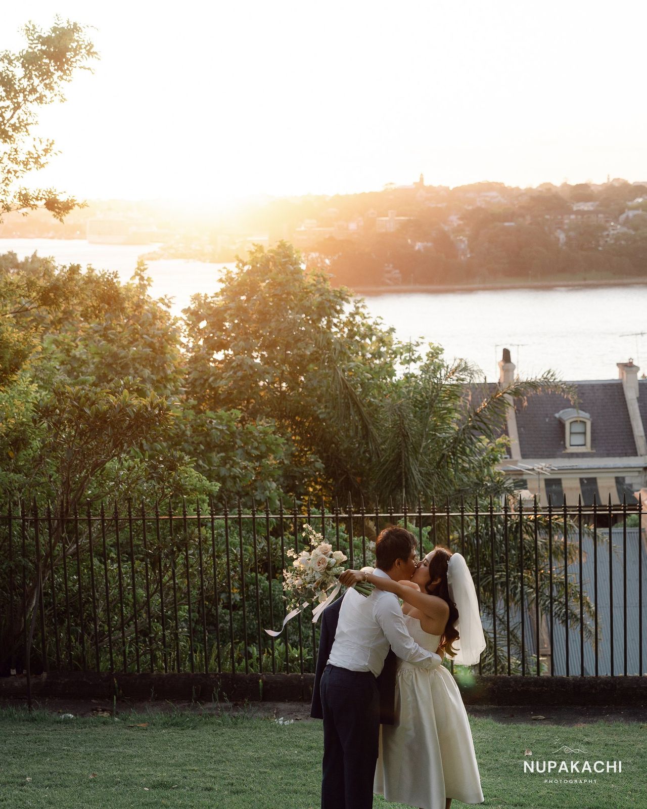 Sunset embrace over the water, Sydney pre-wedding session